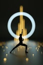 Fighter performing karate. Abstract black plastic human body fighter silhouette. Action high kick pose Royalty Free Stock Photo