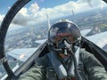 Fighter Pilot in Cockpit Over Cityscape Royalty Free Stock Photo
