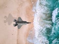 Fighter plane flies over a sea