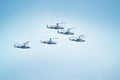 Fighters, flying helicopters at The Victory Day military parade. Royalty Free Stock Photo