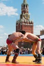 The fighters are locked in Mongolian wrestling