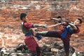 Fighters take part in an outdoor ancient Thai fencing.