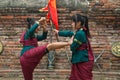 Fighters take part in an outdoor ancient Thai fencing.