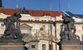 Fighting Giants statues On Prague Castle Gate. Panorama. Royalty Free Stock Photo