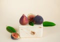 Figs close-up on a pastel background on a wooden cube. Modern kitchen trends. The concept of proper nutrition,vegetarian diet