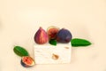 Figs close-up on a pastel background on a wooden cube. Modern kitchen trends. The concept of proper nutrition,vegetarian diet