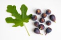 Figs fruits and leaf on white background, top view Royalty Free Stock Photo