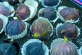 Figs in a paper containers are put up for sale on fruit market