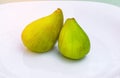 Figs on the white plate, jam cooking process. Royalty Free Stock Photo