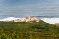 Cabo Mondego lighthouse facing the ocean, Figueira da Foz, Portugal Royalty Free Stock Photo