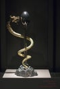 Dali sculpture of a Gold dragon