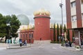 The Dali Museum in Figueres, the movement of cars and tourists near the museum.