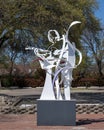 Figurative steel sculpture by Joshua Weiner on 15th Street in Plano, Texas.