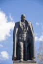 Figure of Admiral Kolchak on the monument in Irkutsk against the blue sky