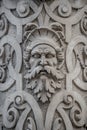 Figure of ancient old scary bearded warrior as gatekeeper, Vienna, Austria, details, closeup