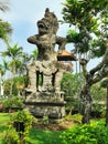 A figure of a Balinese Hindu guardian on a street on Bali Island in Indonesia