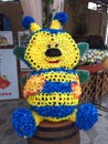 The figure of a bee made of flowers