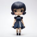 Kawaii Chic Vinyl Toy With Blue Hair And Black Dress