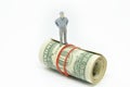 Figure of businessman on one dollar Royalty Free Stock Photo