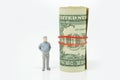 Figure of businessman and one dollar bill Royalty Free Stock Photo