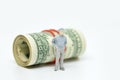 Figure of businessman and one dollar bill Royalty Free Stock Photo