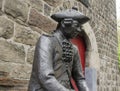 Figure of a carving Pennsoldier in bronze by Klaus Gehlen, 2007.