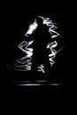 Figure in chaotic lights Royalty Free Stock Photo