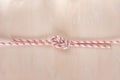 Figure eight Bend or Flemish Bend ship knot on wooden background