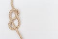 Figure-eight knot or Flemish knot on light rope Royalty Free Stock Photo