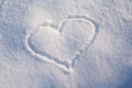 Figure of eight written in the snow in the painted heart