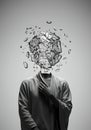 Figure with Exploding Cube Head and Hand on Chest in Grayscale