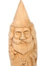 The figure of the good Wizard carved from beech with a staff and a scroll in hands. Old decorative toy