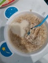 figure - heart with milk in baby porridge