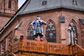 Figure of Heidelberg jester and court dwarf `Perkeo on top of half-size replica of giant wine barrel at the Heidelberg Castle