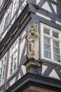 The figure of Hermes on the corner of the facade of a vintage German building