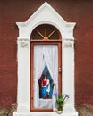 Figure of Mary holding Jesus in a outdoor shrine Royalty Free Stock Photo