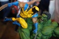 Figure model Hulk vs Wolverine, Superhero fighting battle, Character from Marvel comic, Toy collections in exhibition show. Royalty Free Stock Photo