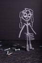 A figure of one small robot assembled from several bolts and nuts standing in a vertical position . It symbolizes technology, Royalty Free Stock Photo