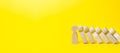 The figure of a person stops the fall of a set of figures like dominoes. business training, self-improvement, stress resistance