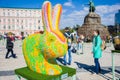 The figure of a rabbit or hare in the guise of the chameleon against the background of monument to Bohdan Khmelnytskyi. Beautiful Royalty Free Stock Photo