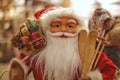 Figure of Santa Claus with wooden skis, Christmas decoration for holiday interior Royalty Free Stock Photo