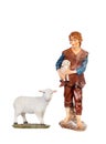 Figure of the shepherd with a sheep for the nativity portal Royalty Free Stock Photo