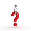 Figure sitting on a question mark Royalty Free Stock Photo