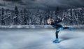 figure skater on winter lake background Royalty Free Stock Photo