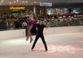 Figure skating performance on holiday Galleria ice center Royalty Free Stock Photo