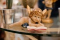 The figure of a small angel. Interior Decor. Selective focus Royalty Free Stock Photo