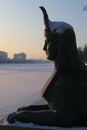 The figure of the Sphinx on the background of the winter Malaya Nevka