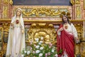 figure of the statue of the Sacred Heart of Jesus and statue of the Sacred Heart of Mary together on an altar Royalty Free Stock Photo