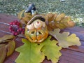 The figure of the symbol of Halloween on a wooden bench