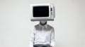 Figure with television set for a head on a light background. Concept of media influence, anonymity, information overload Royalty Free Stock Photo